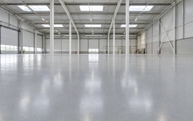 Warehouse floor coating across a wide open storage bay in Halifax Regional Municipality